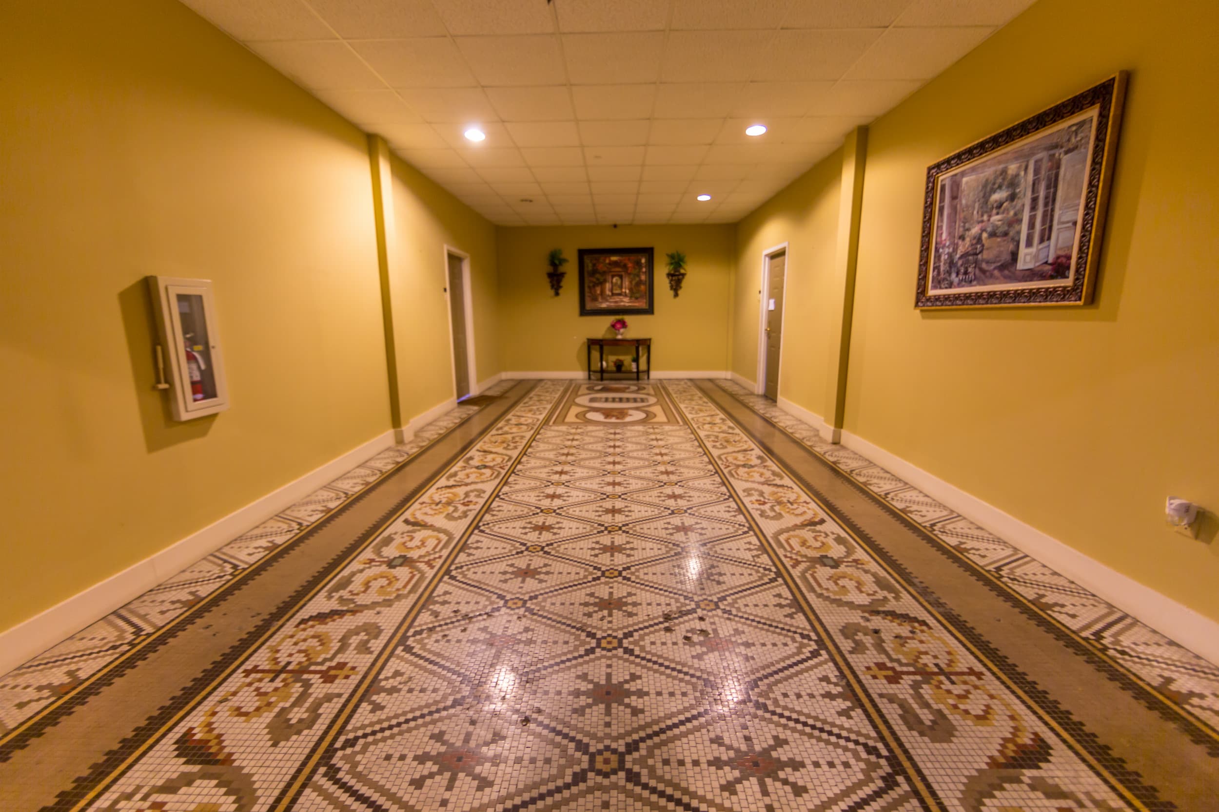 Exchange Building — grand lobby with marble and chandeliers